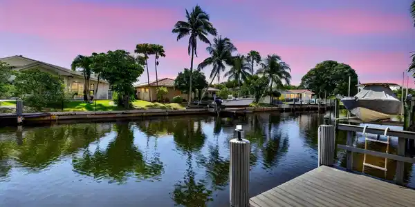 Image 2: 01_Twilight_Canal_View_Private_Dock