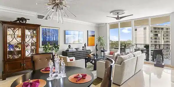 Image 4: Living/Dining RM w/ designer light fixtures & marb