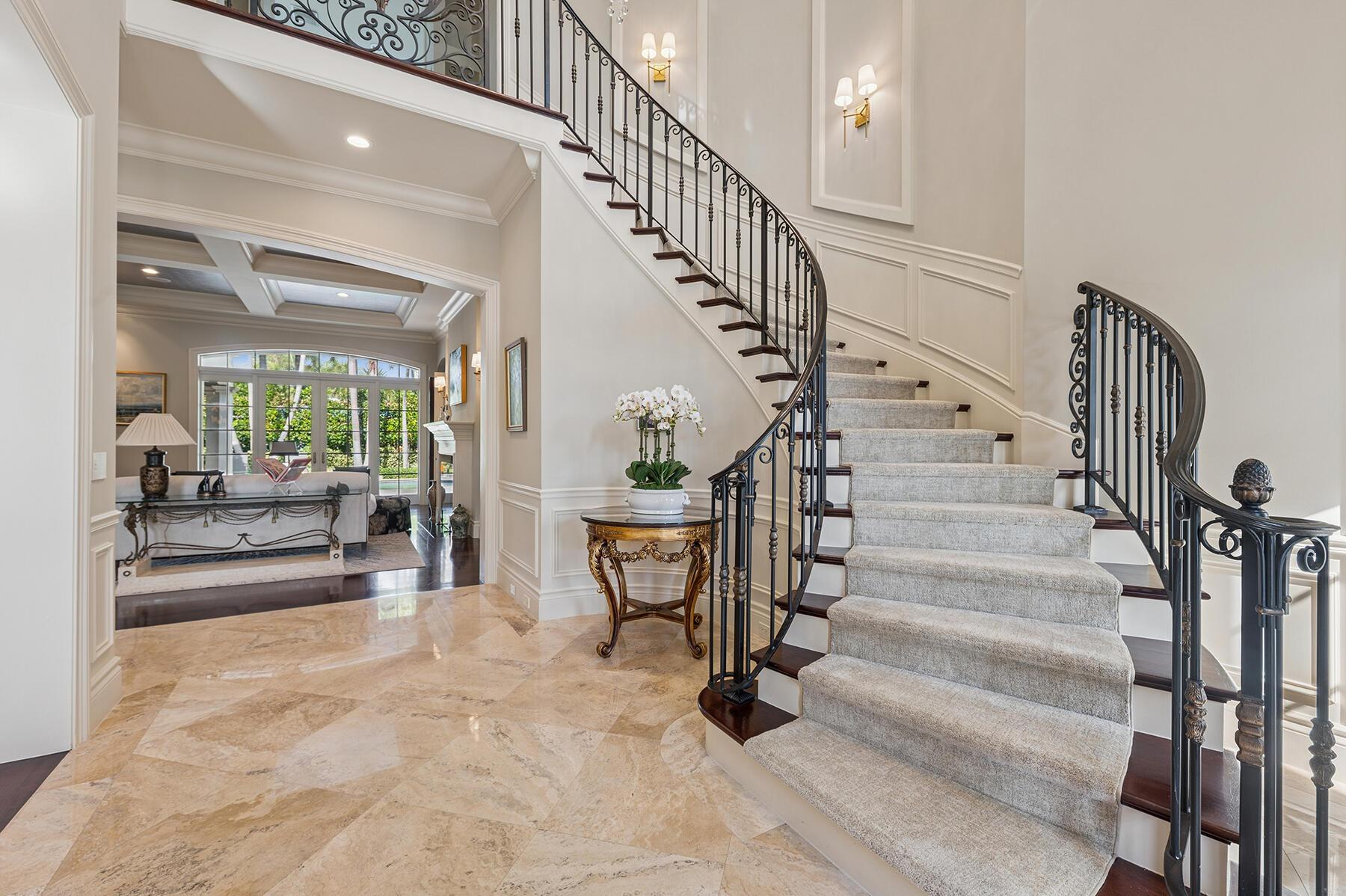 Image 4: Foyer With Winding Staircaase