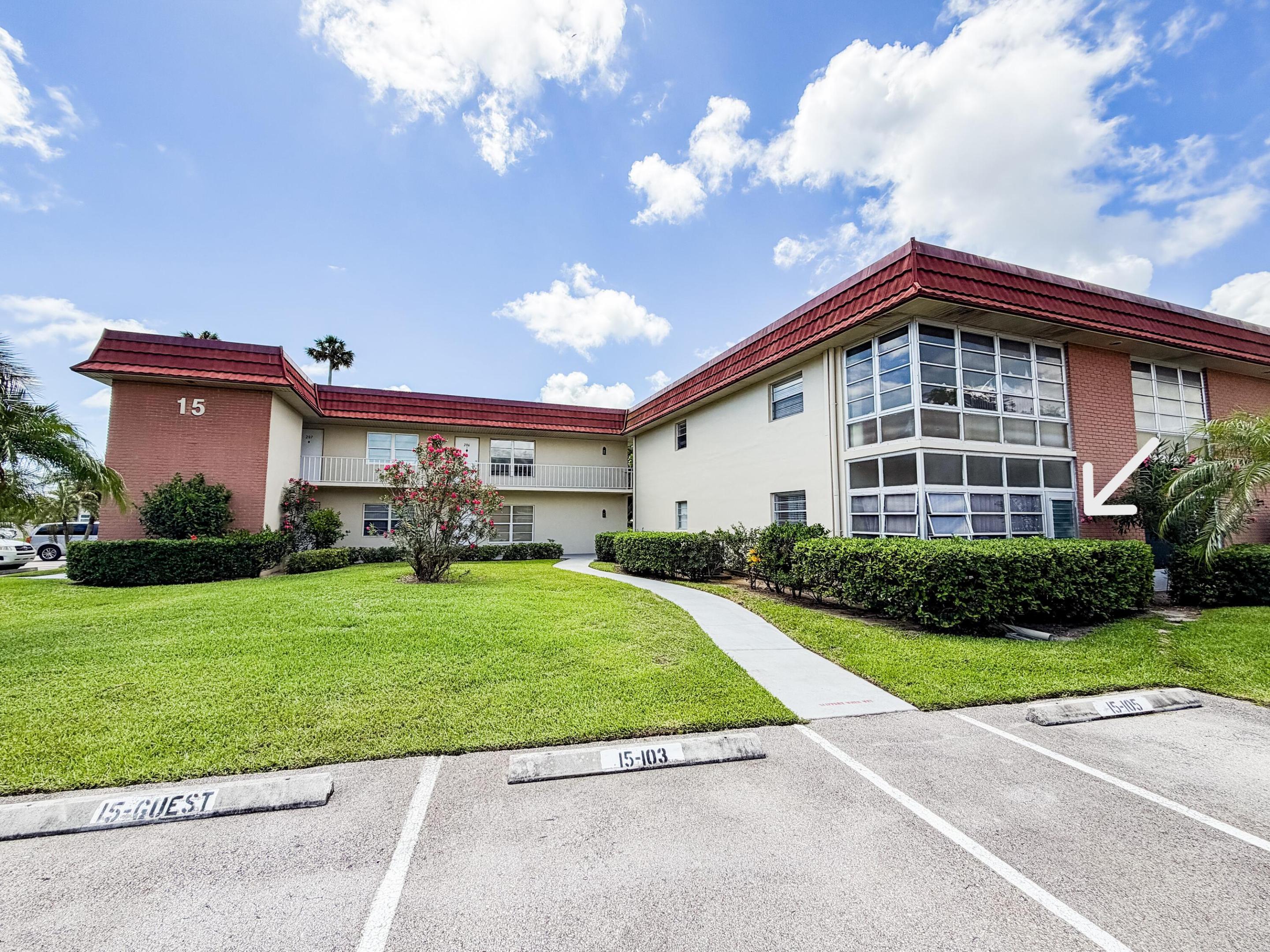 Image 3: ExteriorClubHouse-24 arrow
