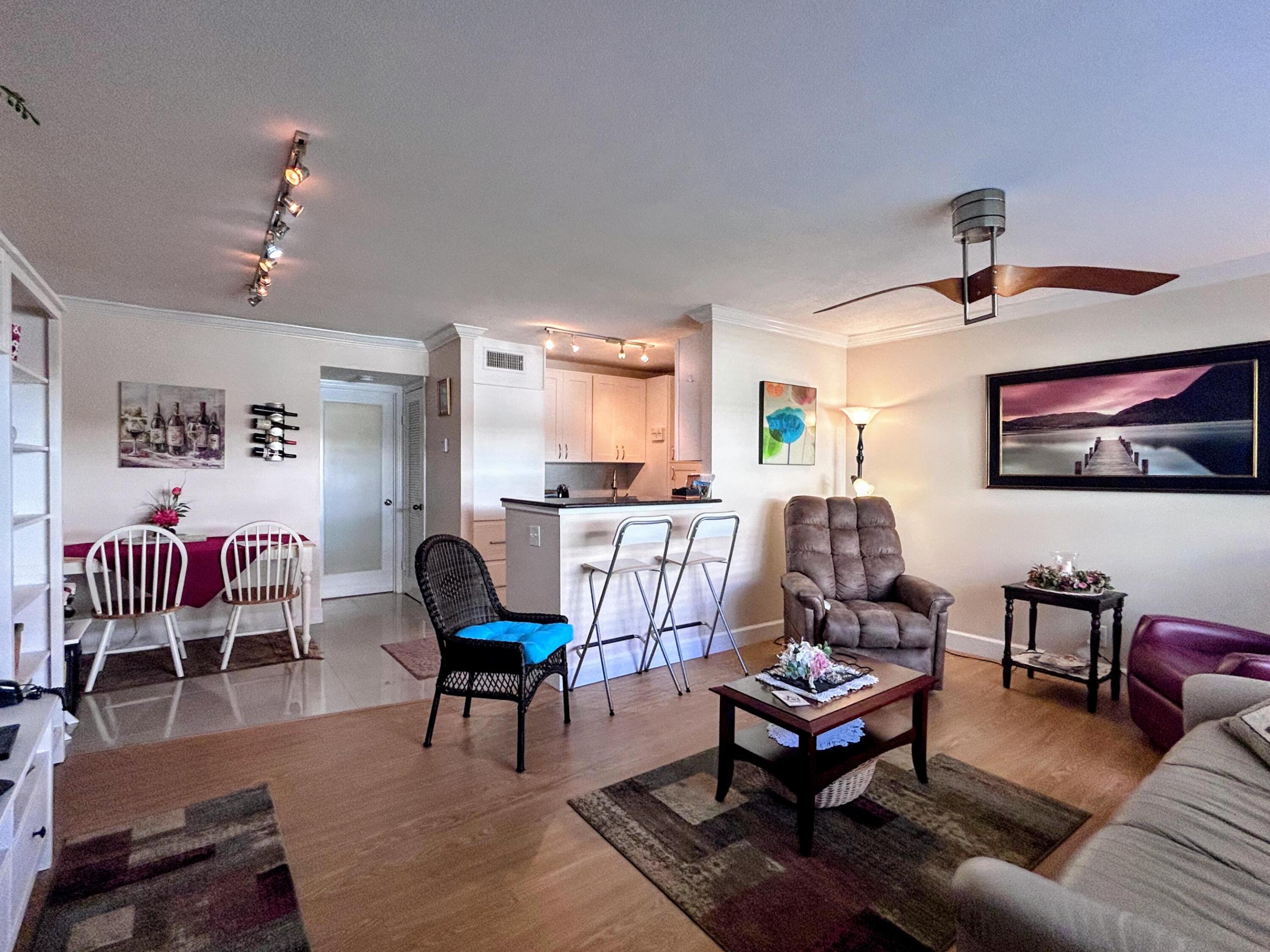 Image 2: Living room into dining and open kitchen