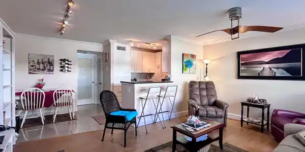 Image 2: Living room into dining and open kitchen