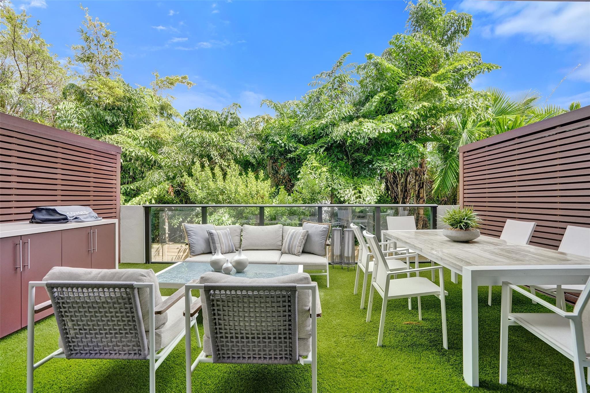 Image 3: large terrace provides a backyard atmosphere