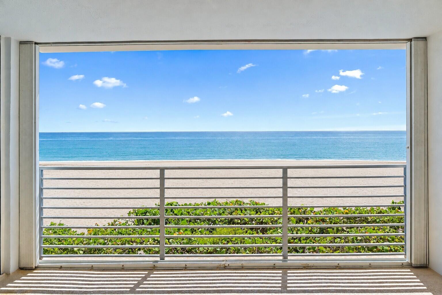 Image 3: Enjoy beach views from your spacious patio.