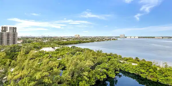 Image 2: balcony view of intracoastal and pond