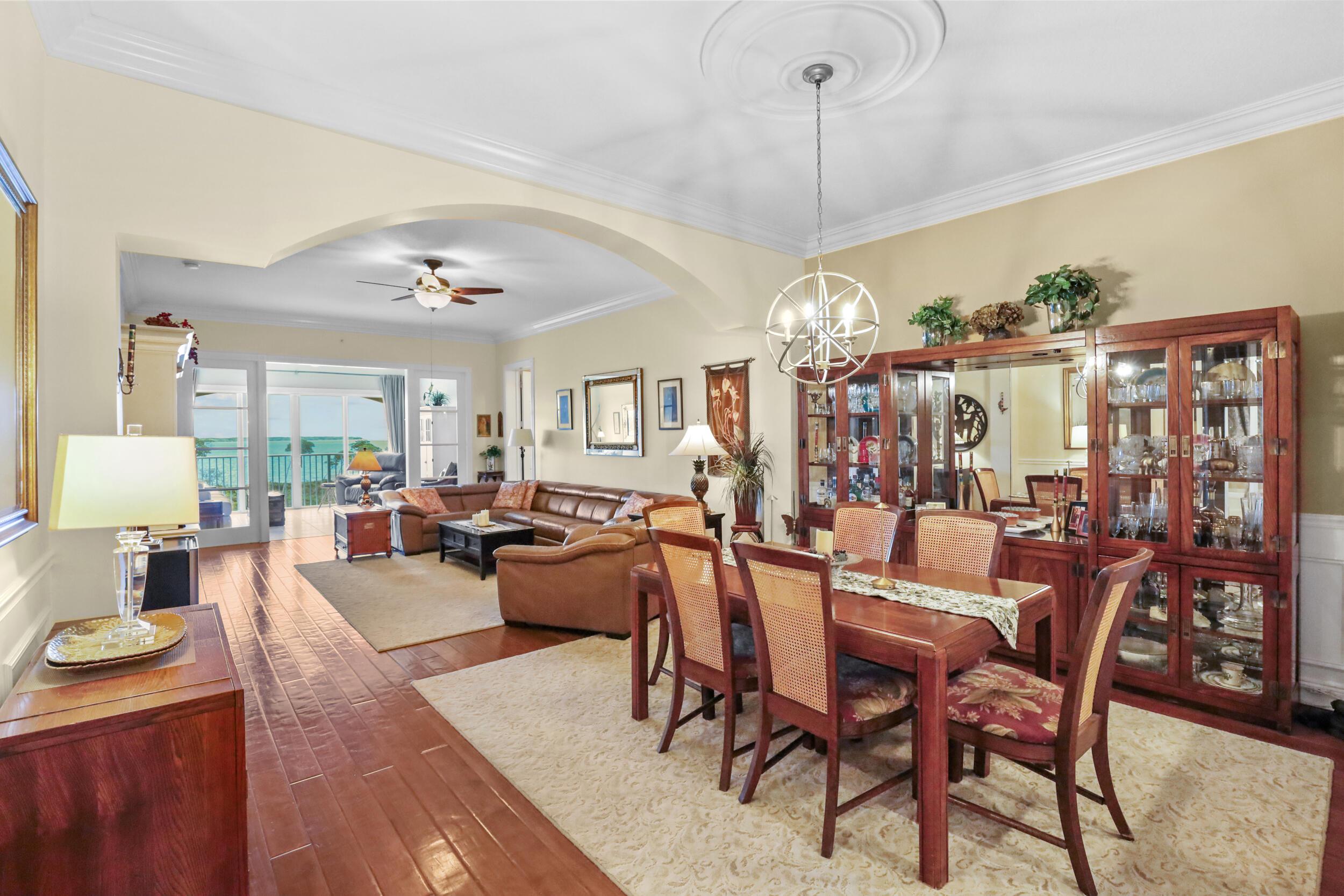 Image 2: Curved archways were added between living/dining a