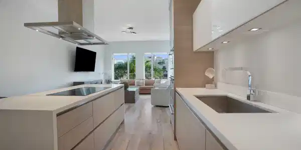 Image 4: Kitchen with Italian cabinetry and modern applianc