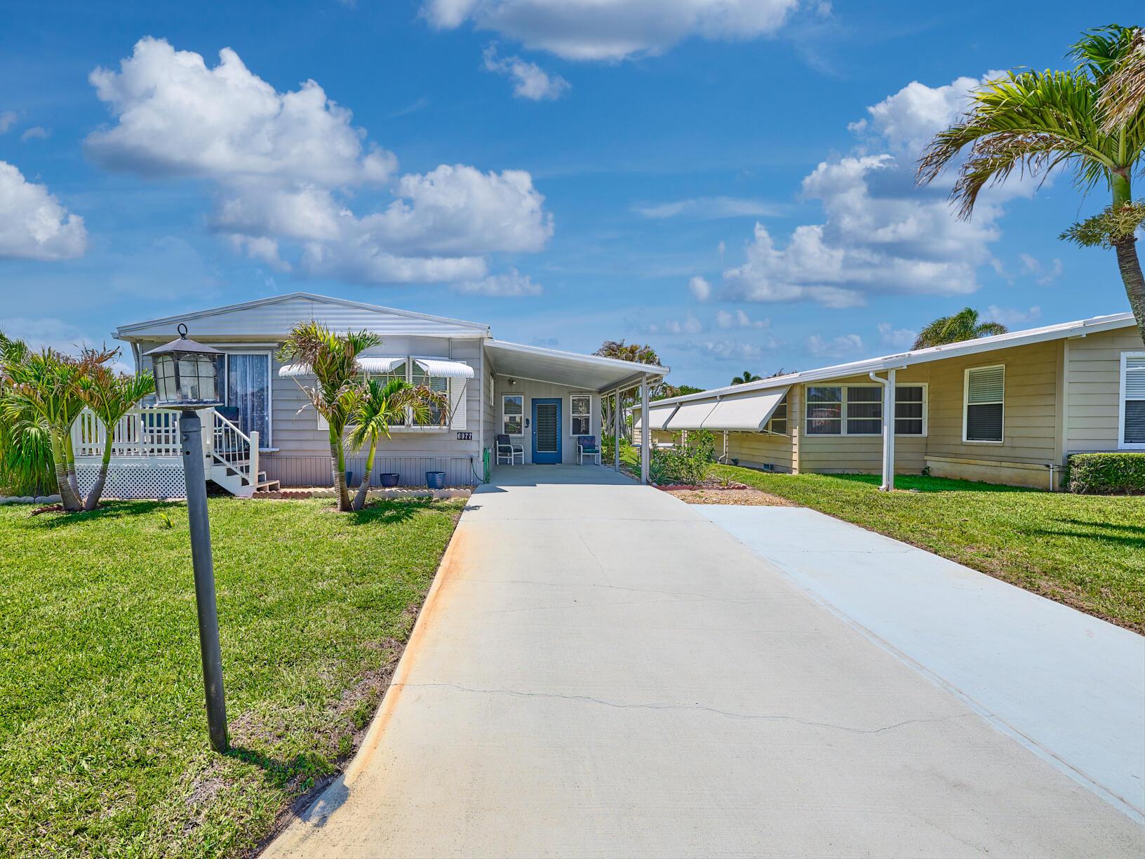 Image 1: EXTERIOR FRONT - EXPANDED DRIVEWAY