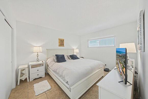 Image 4: Bedroom with king bed