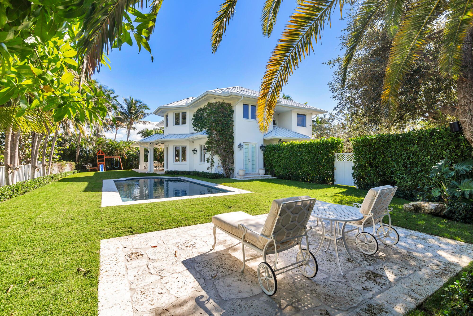 Image 2: Waterfront Pool and Back Yard
