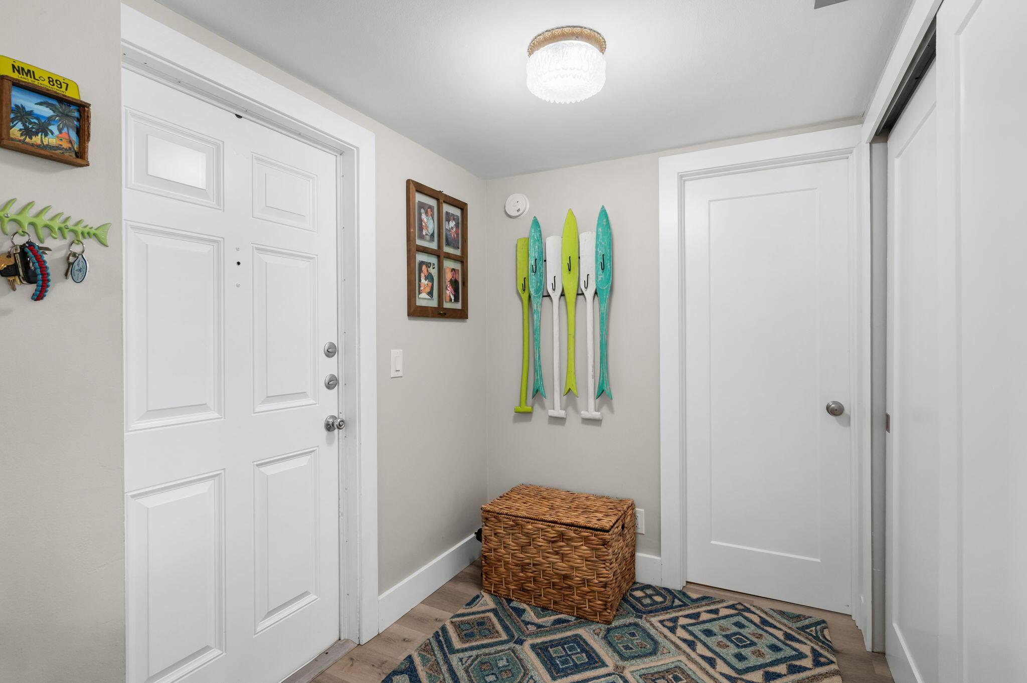 Image 3: Foyer features a storage closet and opens to the g
