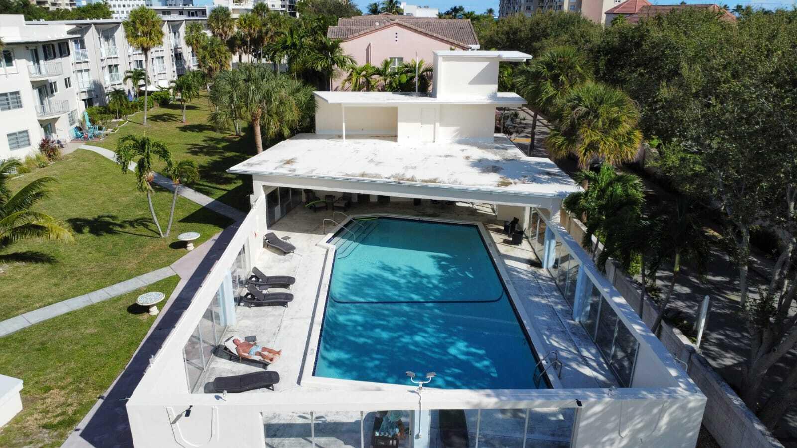 Image 2: HEATED POOL WITH AWNING