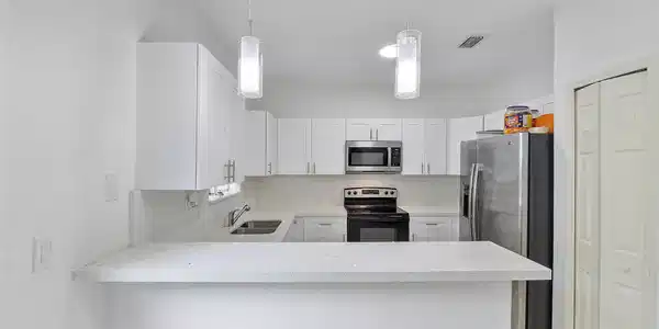 Image 3: FRONT KITCHEN VIEW