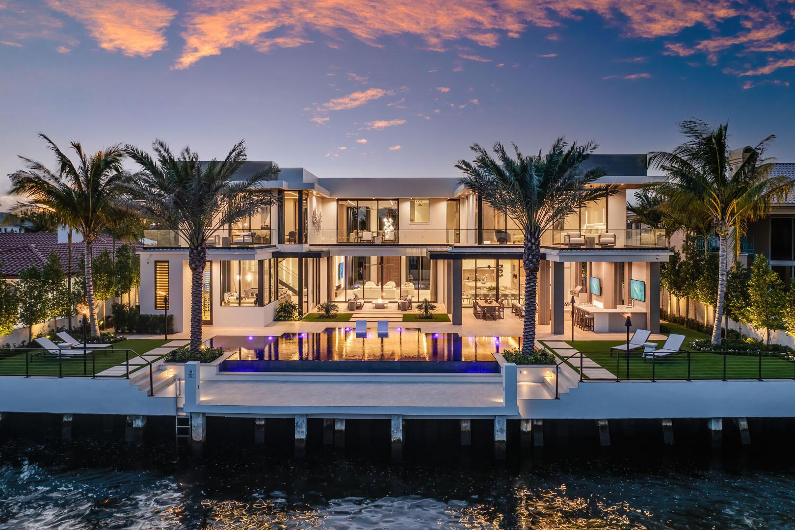 Image 2: 1520_Royal_Palm_Way_Dusk_Drone_04