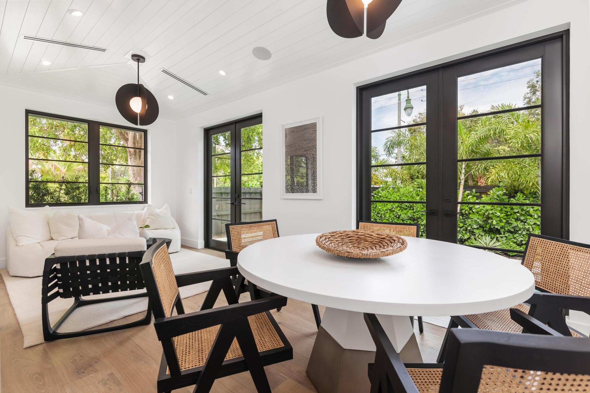 Image 4: Sunroom/Dining Area