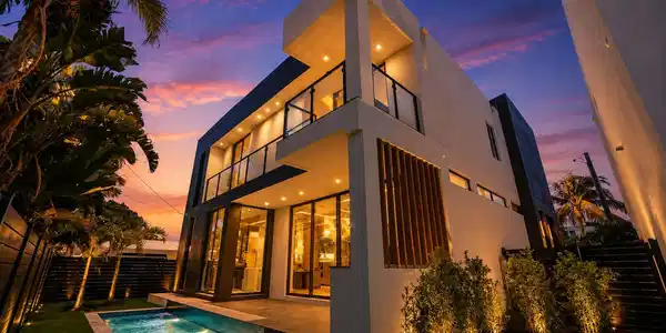 Image 3: Modern exterior with multiple balconies, a ground-