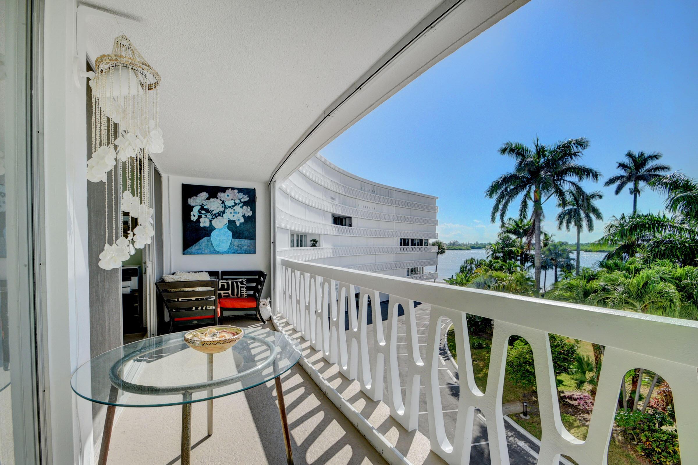 Image 4: Spacious private balcony with a unique patterned r