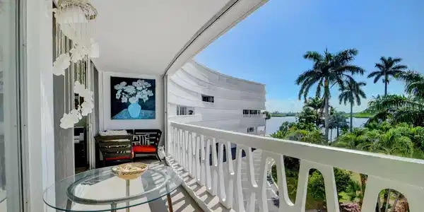 Image 4: Spacious private balcony with a unique patterned r