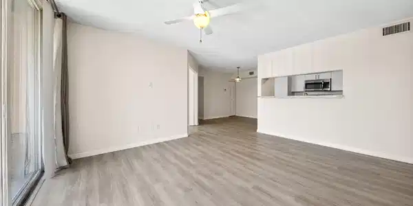 Image 3: LIVING ROOM TO KITCHEN