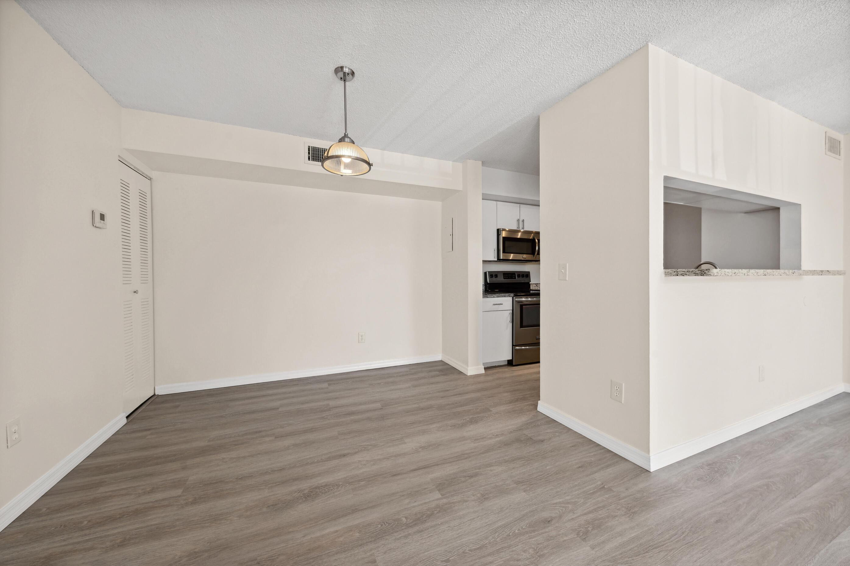 Image 4: LIVING ROOM TO DINING AREA