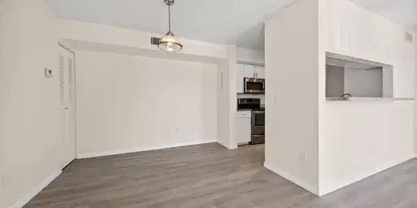 Image 4: LIVING ROOM TO DINING AREA