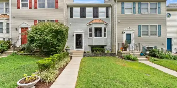 311 SLOPING WOODS COURT