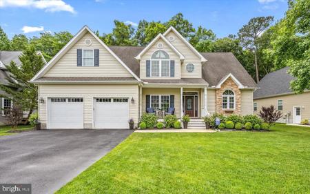 12518 WHISPERING WOODS DRIVE