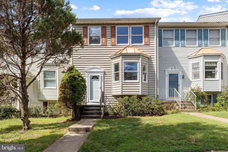 302 SLOPING WOODS COURT