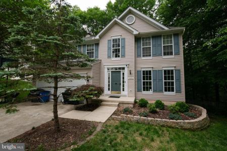 2424 WOODLAND COURT