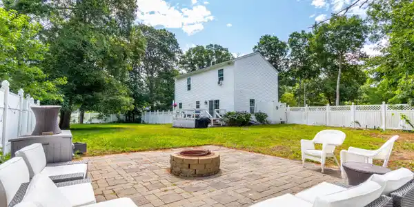 Image 3: Back angle of house and yard