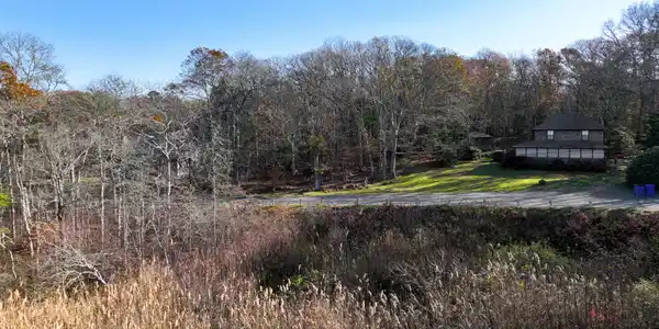 Image 3: View of lot to left of house
