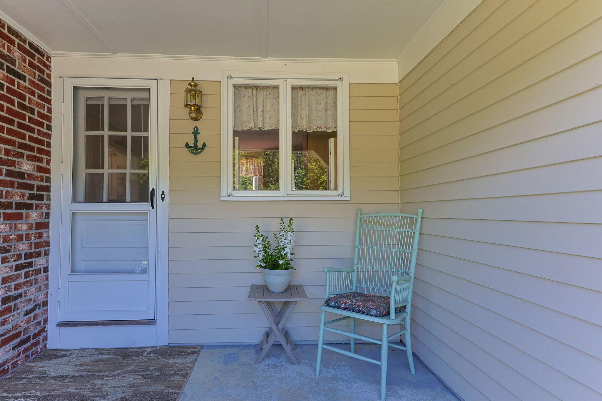 Image 3: front porch green chair