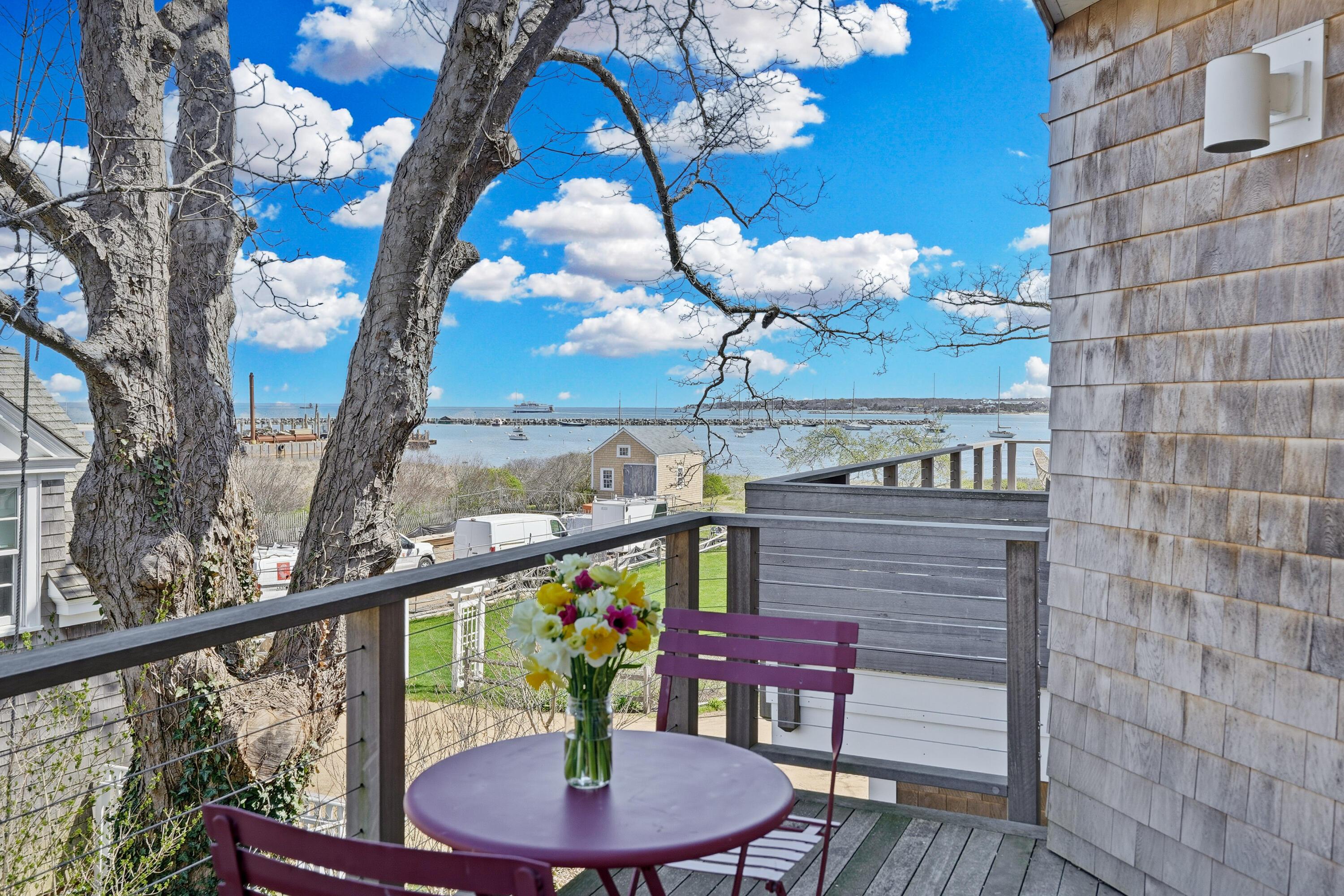 Image 2: Porch offers views of the Harbor