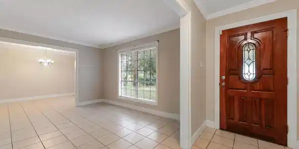 Image 4: Foyer and Living Room