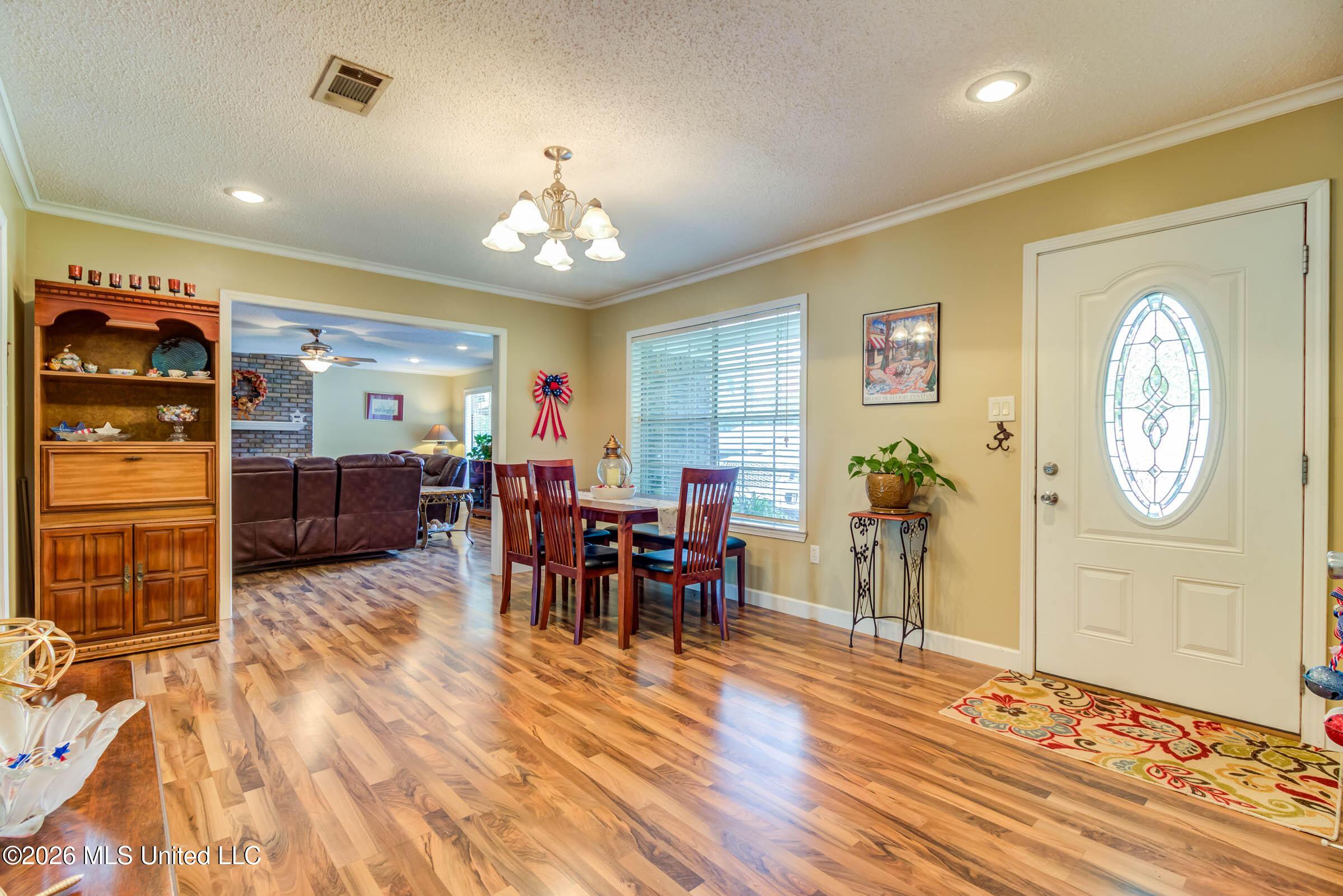 Image 2: Front entry/ sitting room