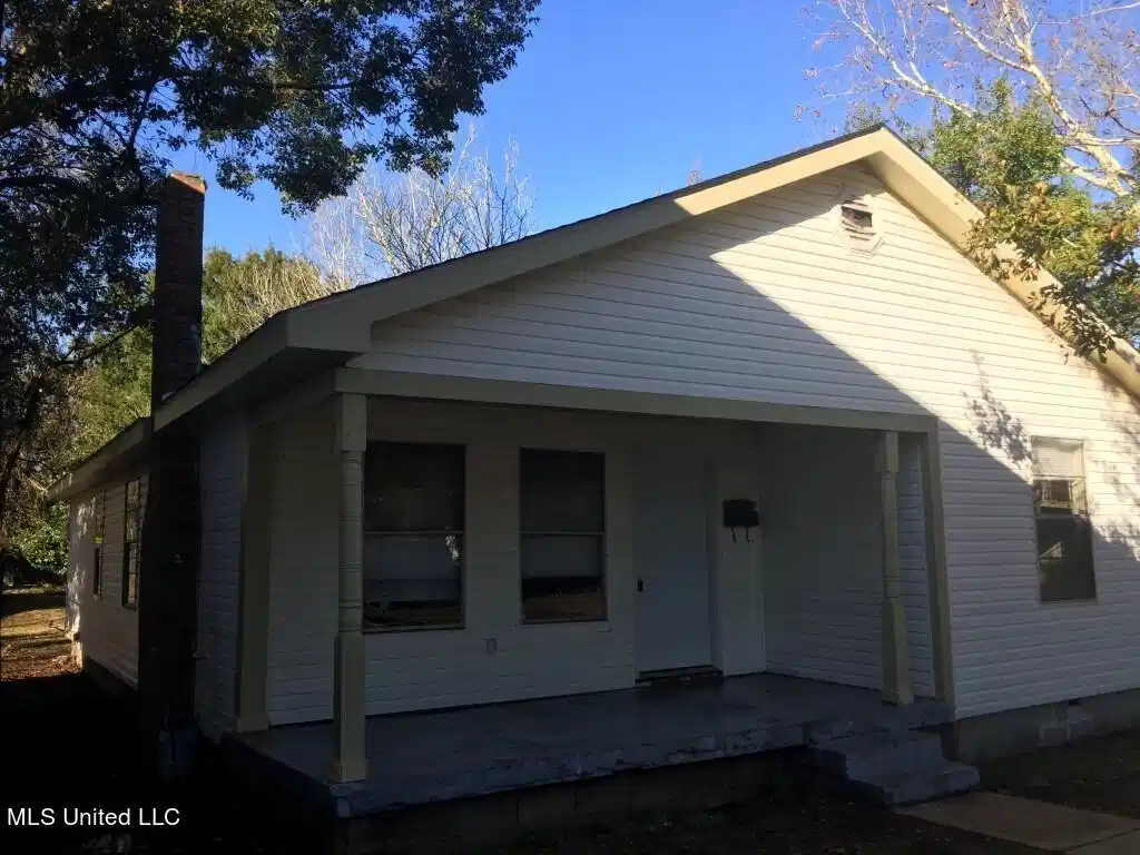 Image 1: front of house