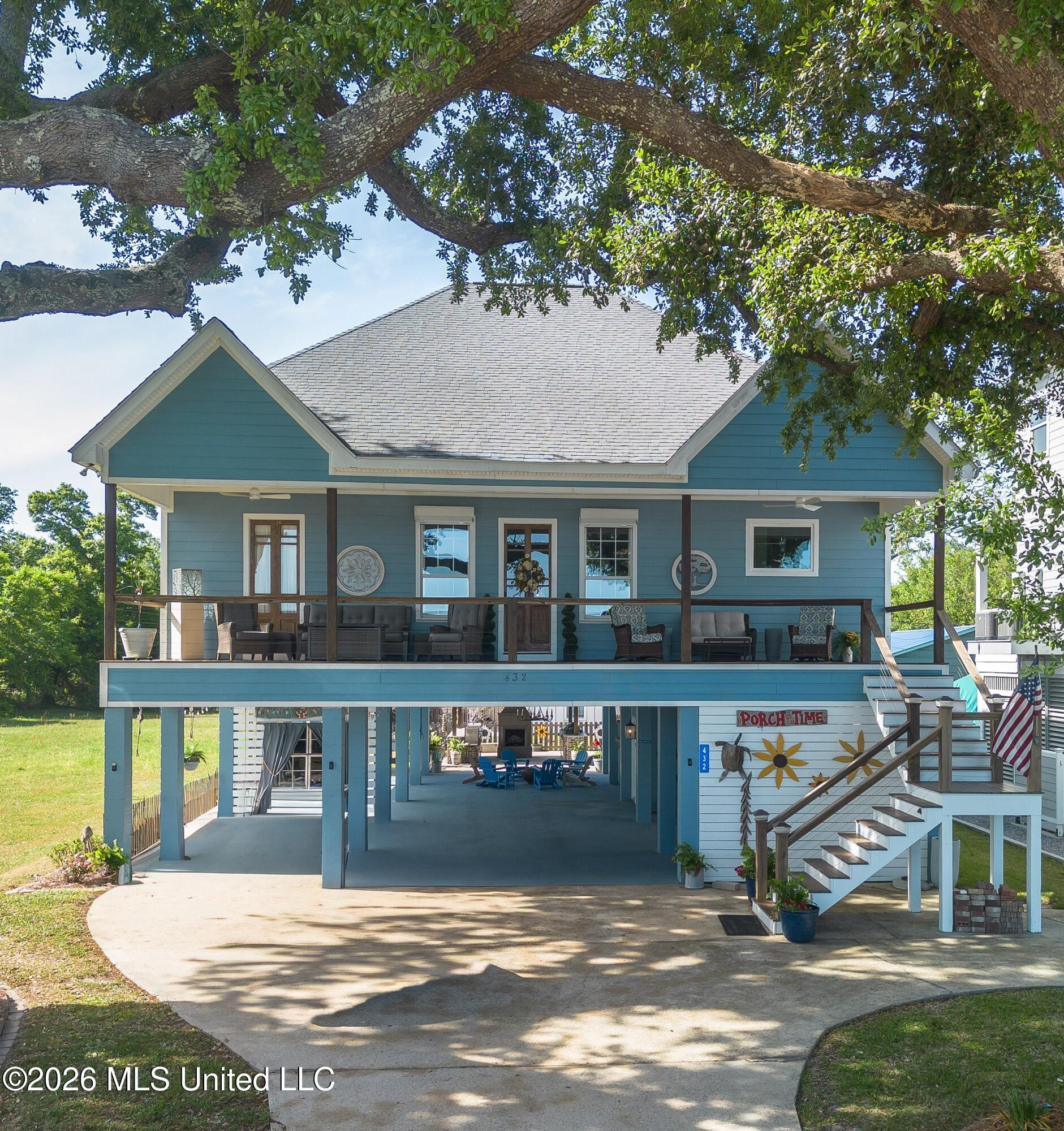 Image 1: blue heron house