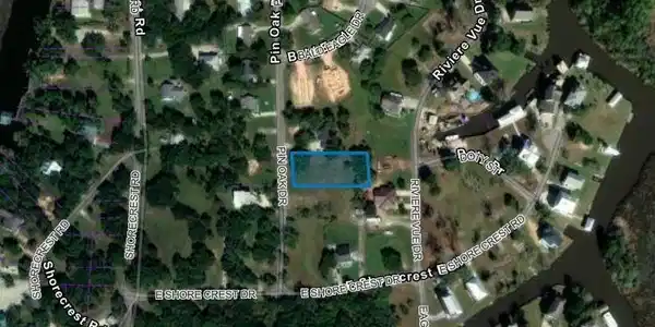 Image 2: Zoomed out aerial image of lot