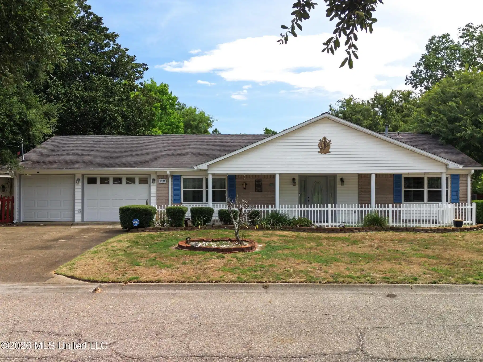 Image 1: front of house