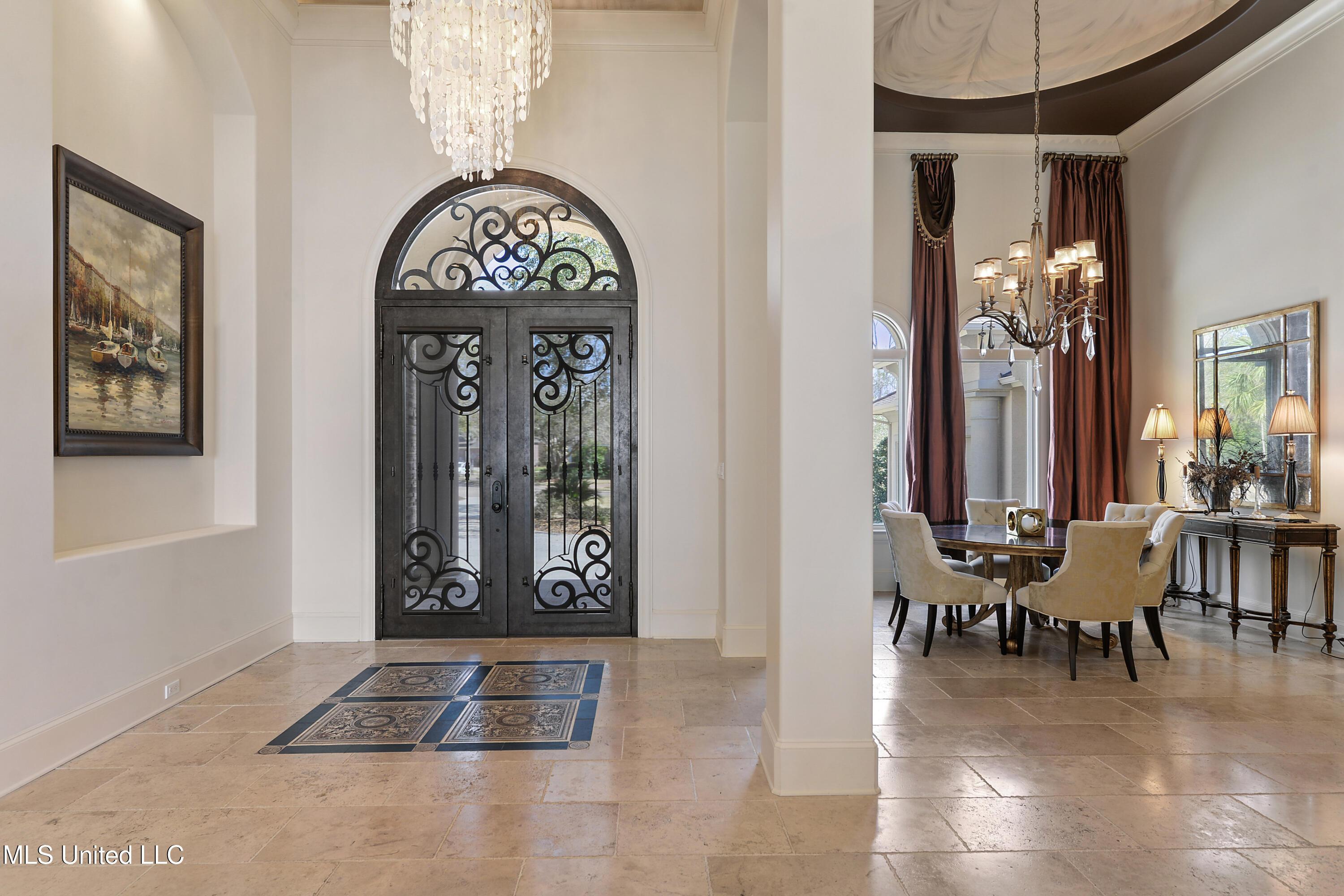 Image 3: foyer and dining
