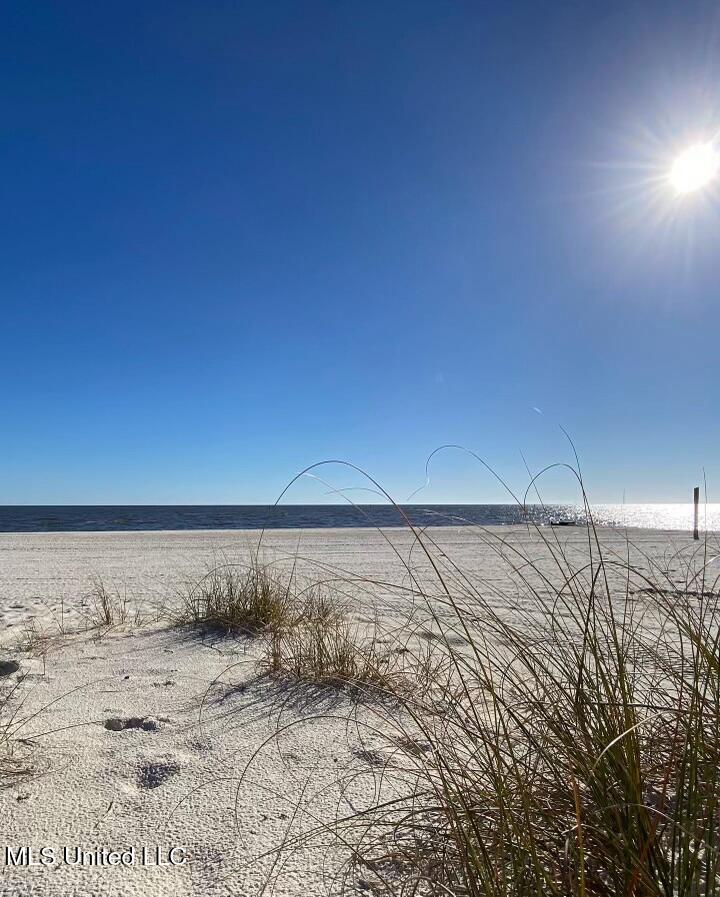 Image 4: Sandy Beach Across Street