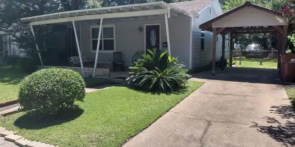 Image 2: Driveway, Carport and Front Entrance