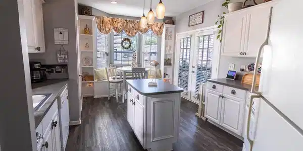Image 3: Kitchen with White Cabinets