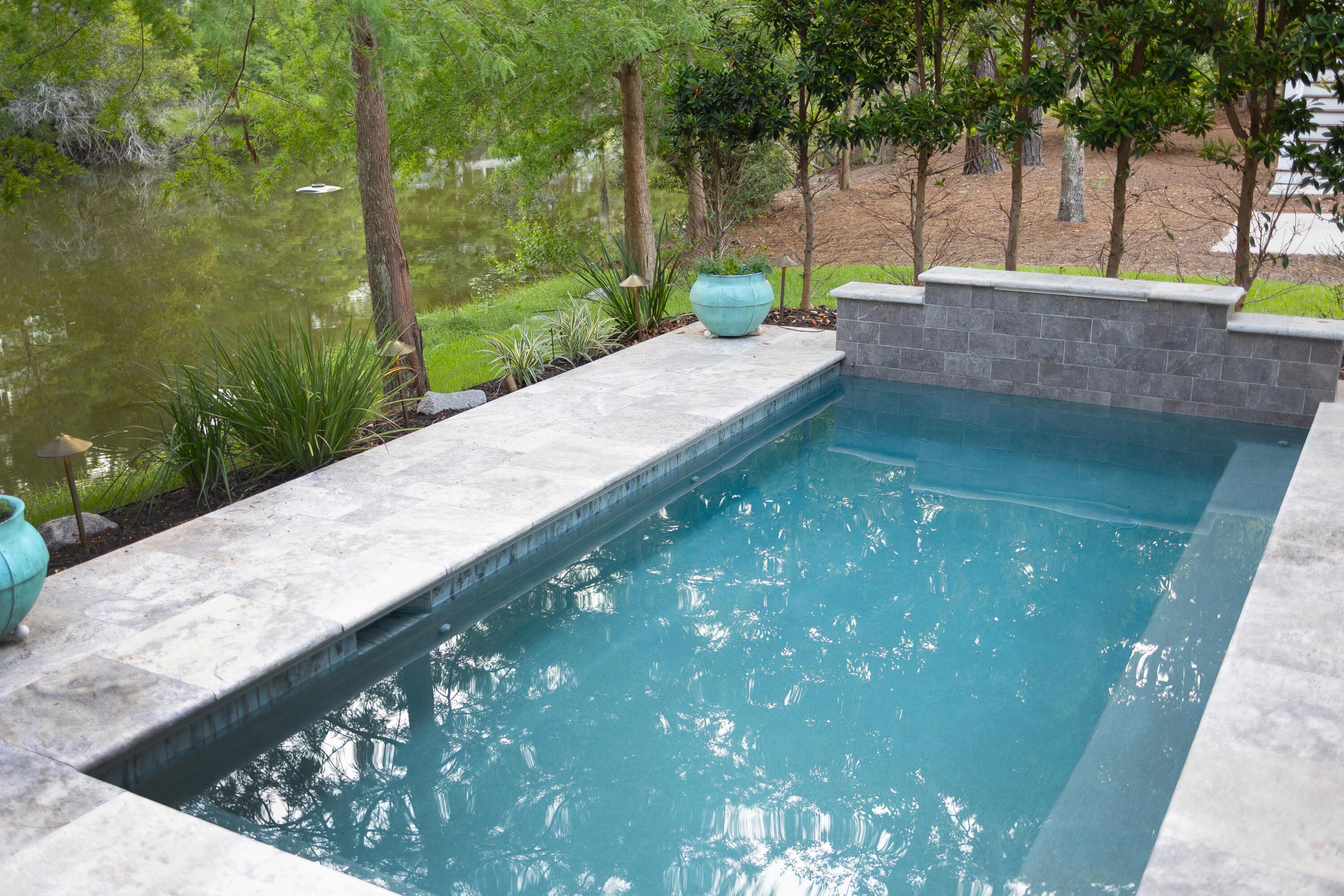 Image 4: 004_Heated saltwater pool with waterfall