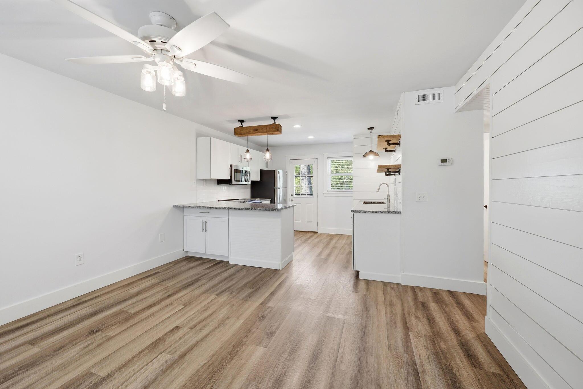 Image 1: Open Living & Kitchen area