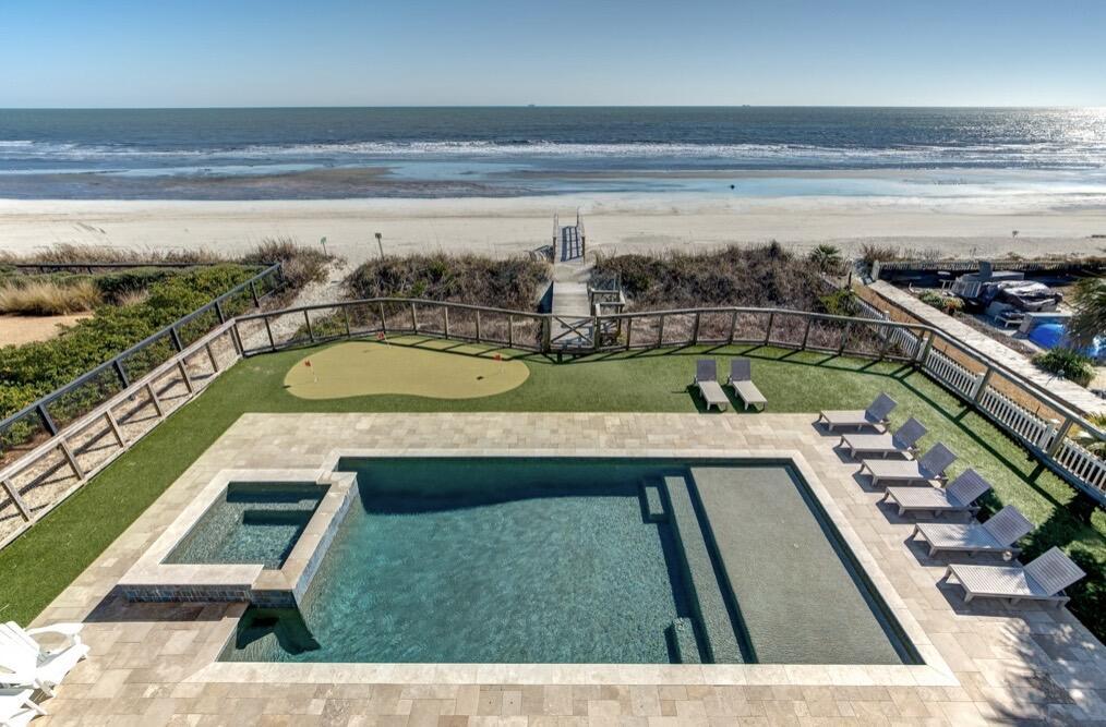 Image 3: View of pool and ocean from back porch