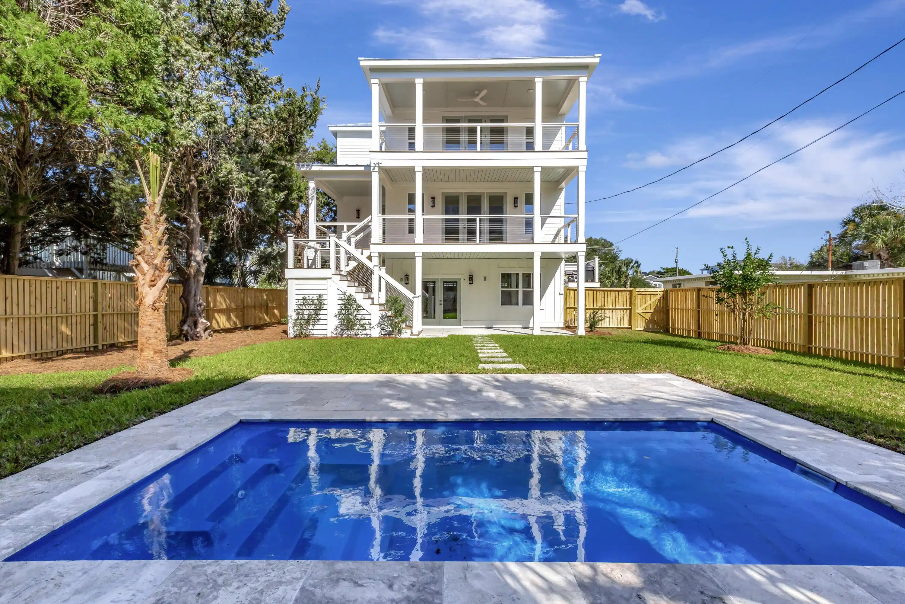 Image 1: 312 Palm Rear yard to house view