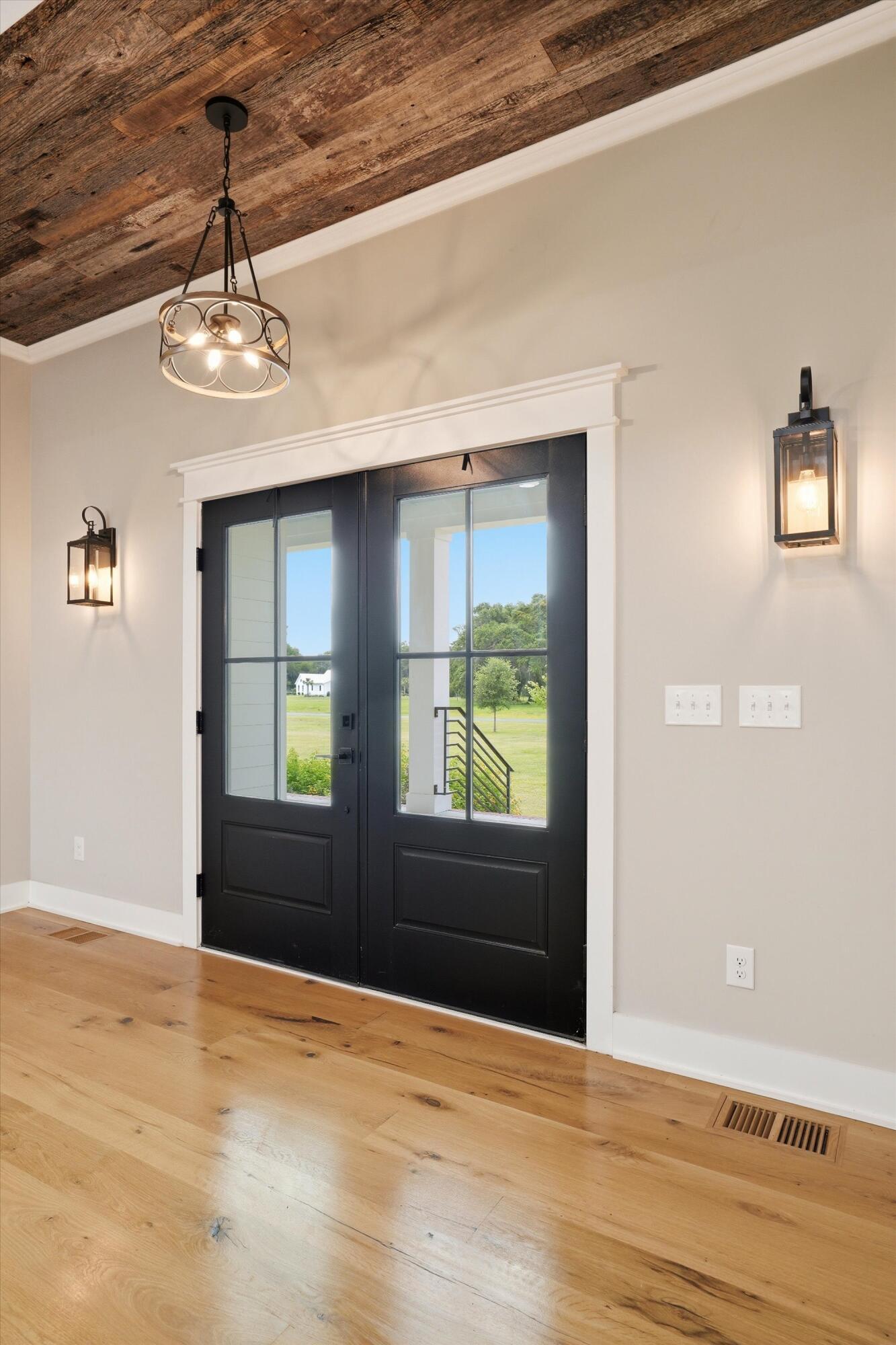 Image 4: Entry Door with wood ceiling