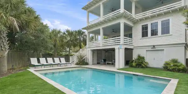 Image 2: Coastal home with tropical backyard oasi