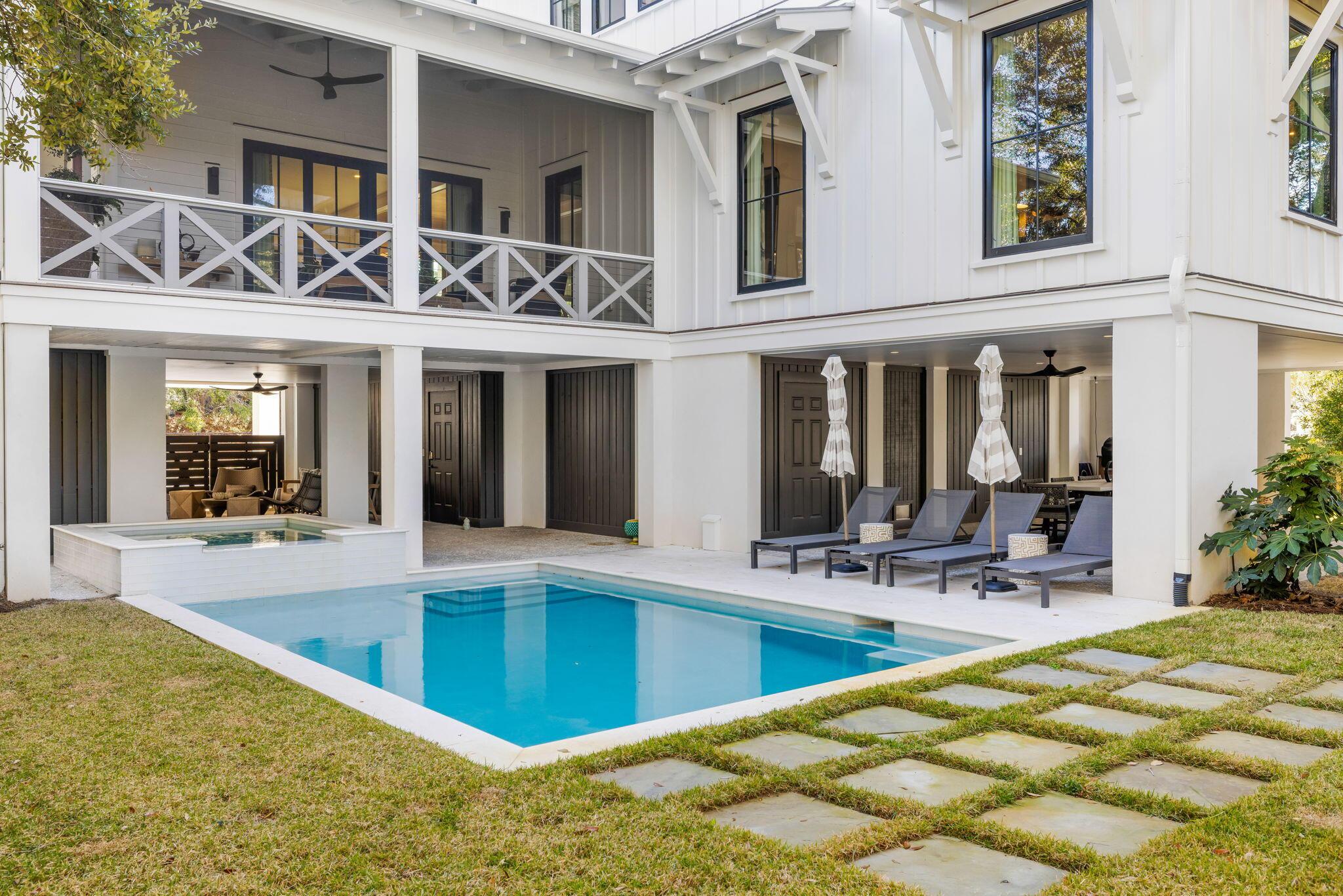 Image 4: Exterior rear of home and pool